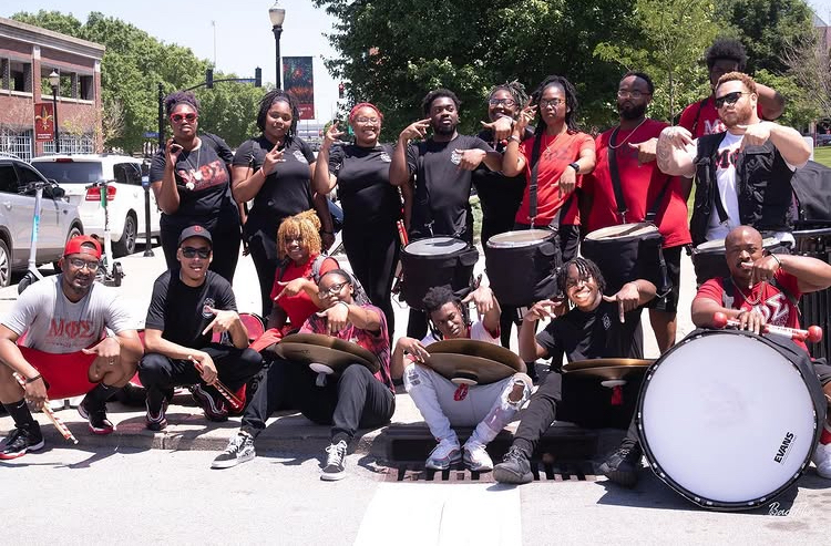 MindFest performers and community members gathered together outdoors